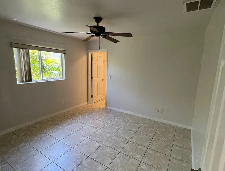Guest bedroom with walk-in closet