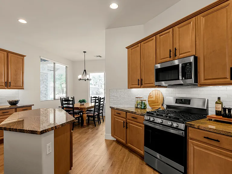 Kitchen - The open layout invites conversation, weather you're preparing a quick breakfast or a family dinner.