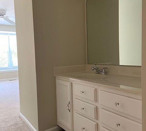 In-room vanity and sink in upper level master bedroom.