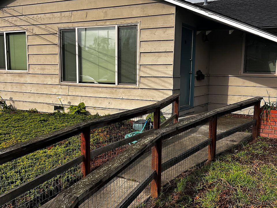 Walkway to unit B door on the left
