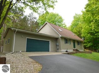 12149 Cabin Ln, Rapid City, MI 49676