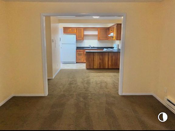 Looking at kitchen from dining area.