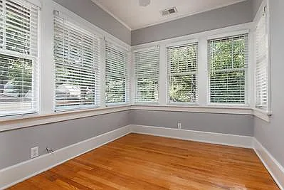 Bedroom/Office with beautiful Refinished Original Rolled glass windows with window weights for easy opening. Google fiber. Closet.