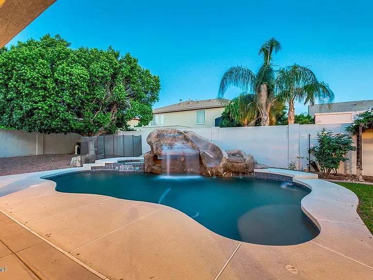 Heated Pool, Water Feature With 2 Water Falls, and Water Slide