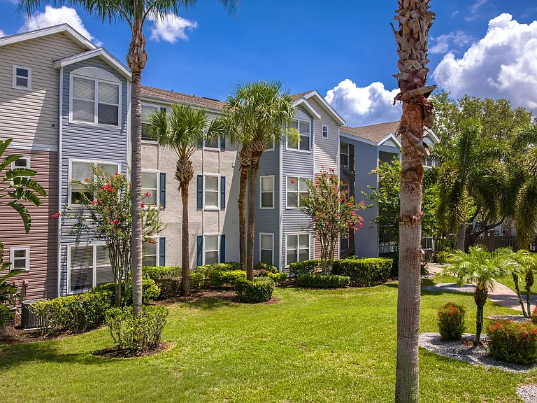 Step outside your door into a tropical oasislush greenery, swaying palms, and colorful blooms surround every apartment home.
