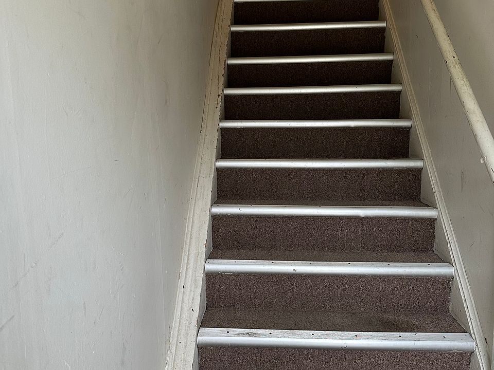 This is the shared hallway stairs to apt
