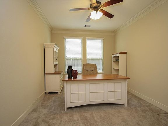 Huge study downstairs could also work as a beautiful formal living room
