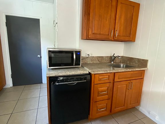 Current Kitchen setup- Being replaced with a whole new layout, new cabinets, new countertops, windows replaced