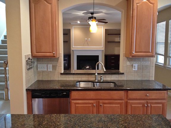 Open floor plan between kitchen and family room.