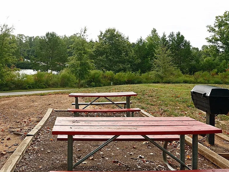 Master the art of grilling at our apartment's outdoor barbecue area