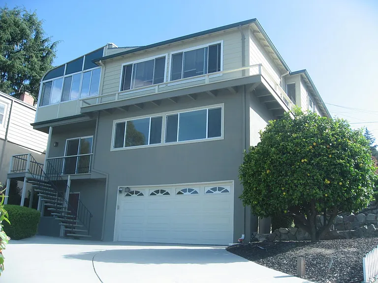 Driveway and staircase to lower/second floor
