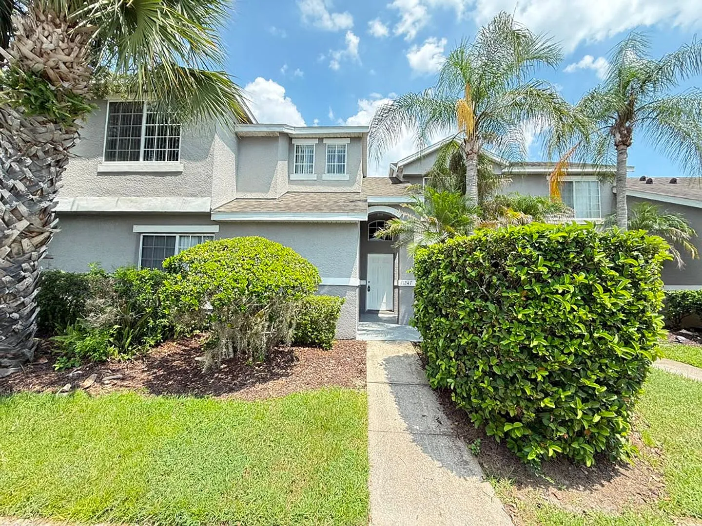 Spacious 3/2.5 Town Home in Meadow Woods! Available Now! — Photo 1