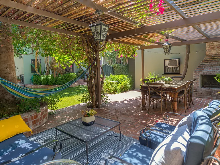 back yard- fire place does is not operable just decorative- trees over