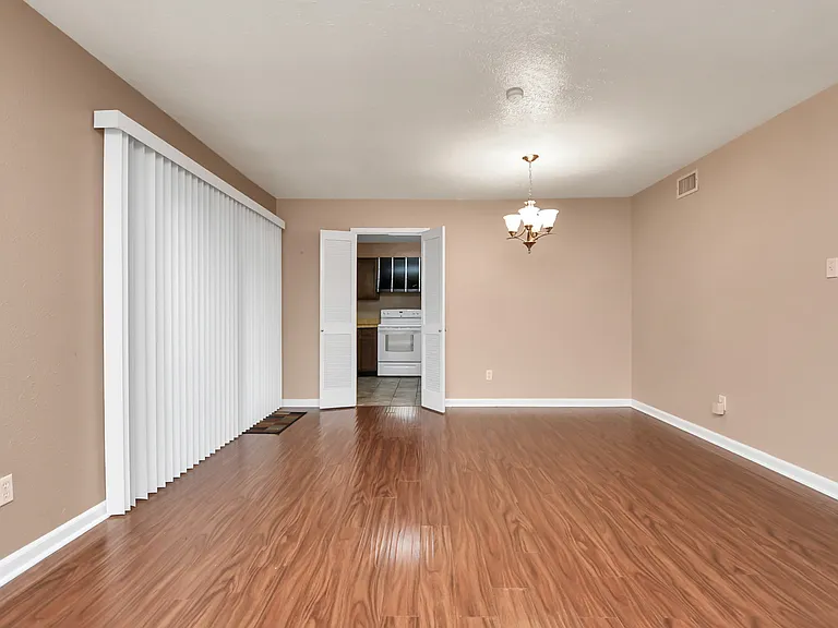 One of two entrances to kitchen, sliding glass doors to covered patio, and dining area off of kitchen.
