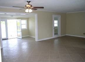 Living area, french doors to pool