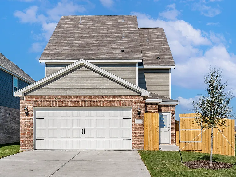 The Bluebonnet has an attached two-car garage.