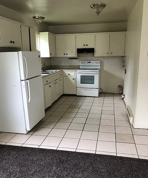 715 Anderson Ave — Photo 2