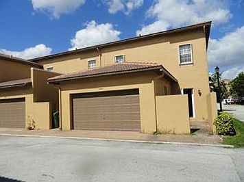 2 cars garage at the back of the house