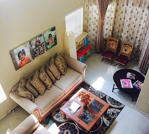 Other side of Living Room with lots of windows for natural l