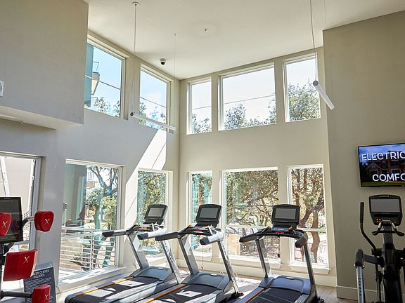 State of the Art Fitness Room With Treadmills at Addison Medical Center Apartments, San Antonio, Texas