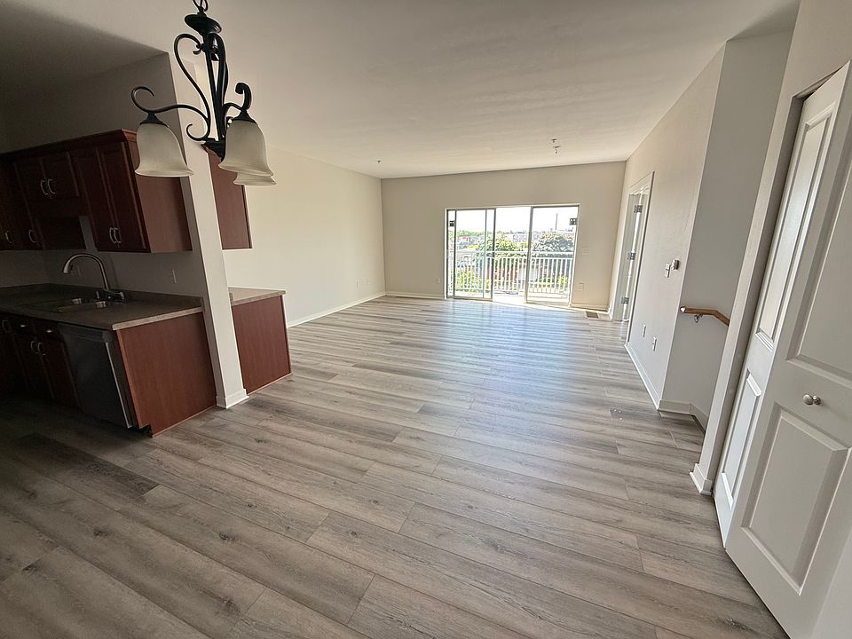 Sunny and bright living room with balcony