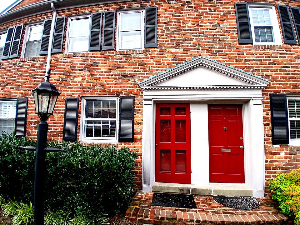 305-J on the left. Storm door and storm windows throughout