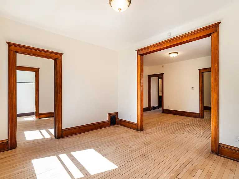 living room looking toward master bedroom (left) & dining room (right)