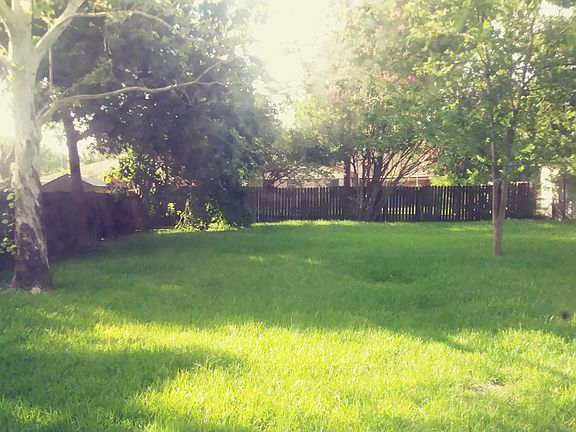 HUGE fenced backyard.