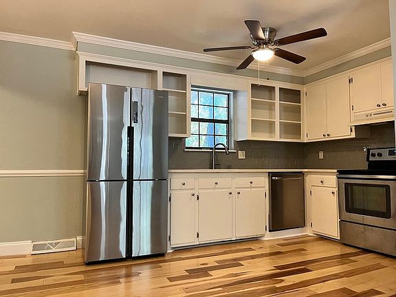 New Haier refrigerator, please note that the ceiling fixture has been upgraded from what you see here, as well as the cabinets