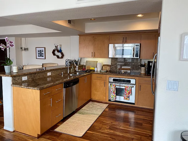 open concept living area with huge south facing windows