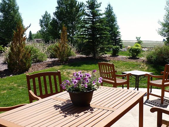 Sunny morning patio, 1/2 shade in afternoon w views of open ranch