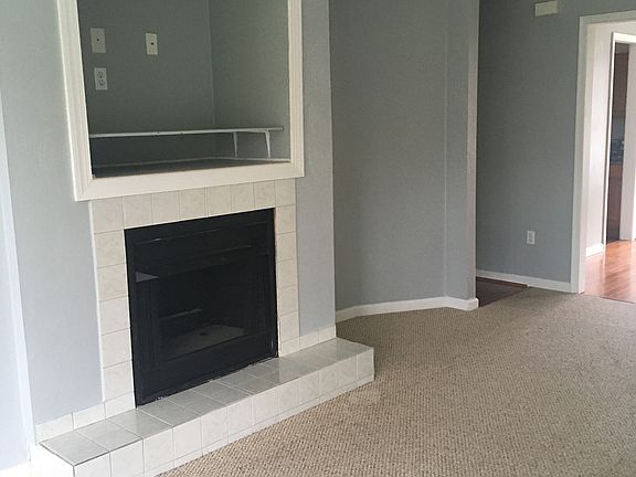 Family/Living room with gas fireplace with a TV niche.