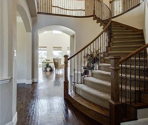 BEAUTIFUL HAND SCRAPED HARDWOODS THROUGHOUT MOST OF THE DOWNSTAIRS AREAS...