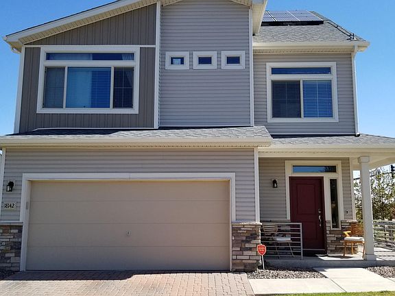 2 car garage. Wrap-around porch. Ring doorbell and Shlage keypad entry.