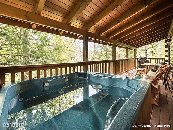 A hot tub on the main level deck