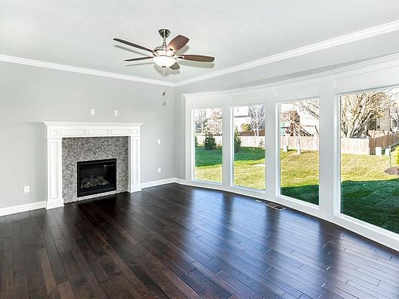 Living room with bay windows
