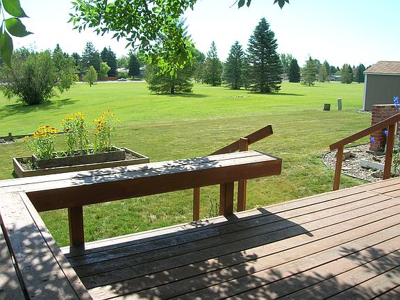 View of deck and backyard