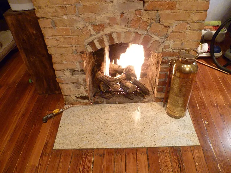 All 4 fireplaces are gas operated and have granite hearths.