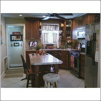 New Kitchen SS appliances walnut cabinets