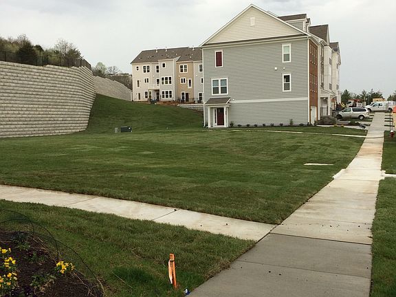 Adjacent to grassy common area