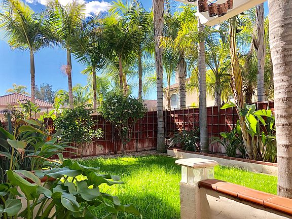Sweet fruit trees and lush grass.