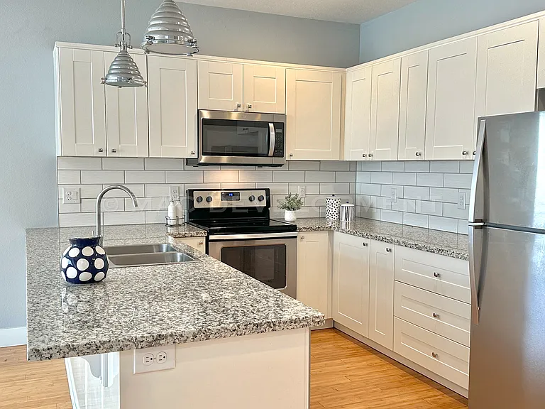 Kitchen-large island with counter seating