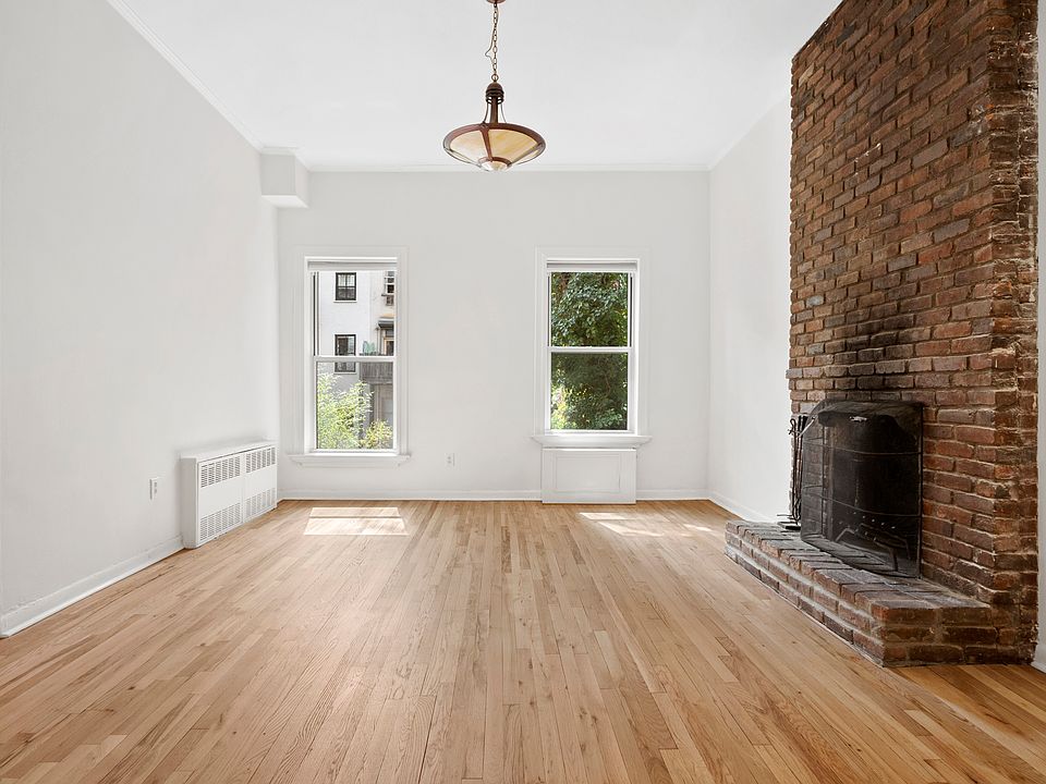 1st image of 460 W 23rd St APT 1B