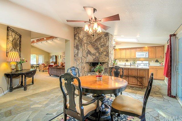 Enjoy a family dinner with this magnificent fireplace as your candlelight.