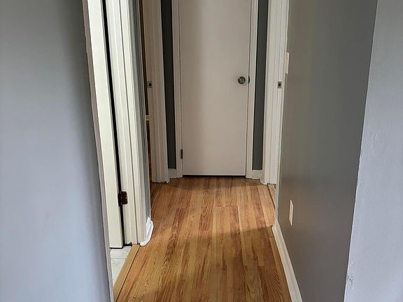 Hallway - full bathroom, bedroom 1, bedroom 2, and linen closet