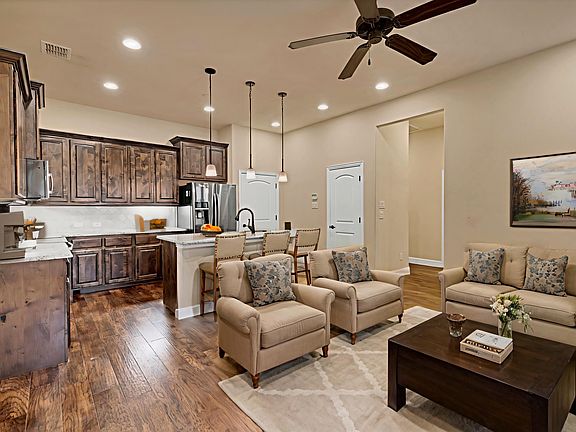 Living Room featuring hardwood floors, recessed lighting and ceiling fan - virtually staged