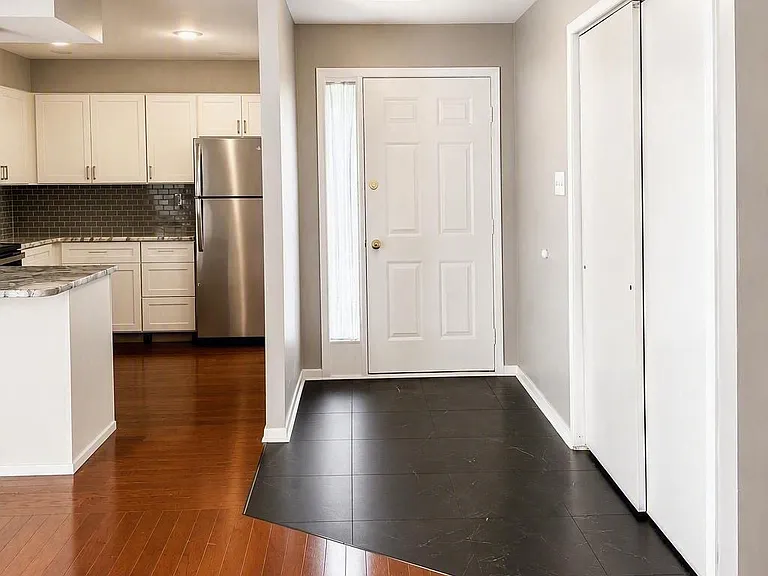 Entry way with large coat closet