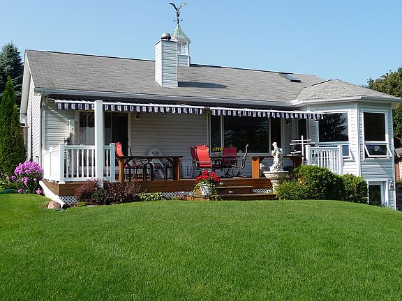 Deck with 2 remote awnings
