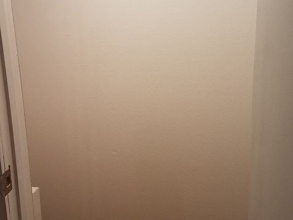 walk in coat closet in living room