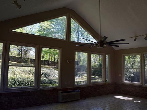 Great Sunroom- Huge Fan, TALL Ceiling, 2 doors to outside, Wonderful natural sunlight.....Great Gathering room